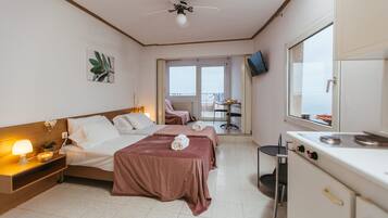 Habitación cuádruple panorámica, vista al océano | 1 habitación, ropa de cama de alta calidad y camas Select Comfort