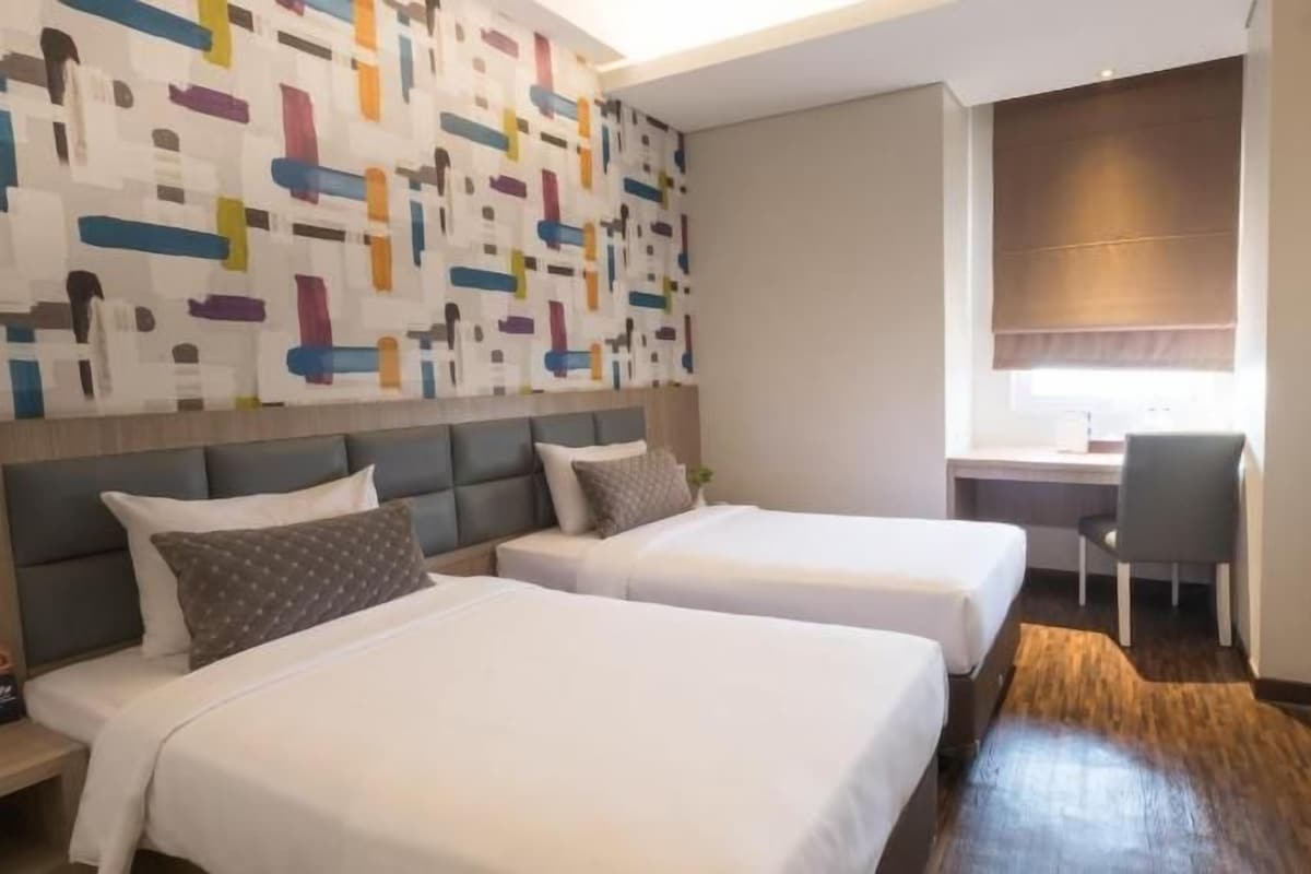 In-room safe, desk, blackout curtains, iron/ironing board (on request)