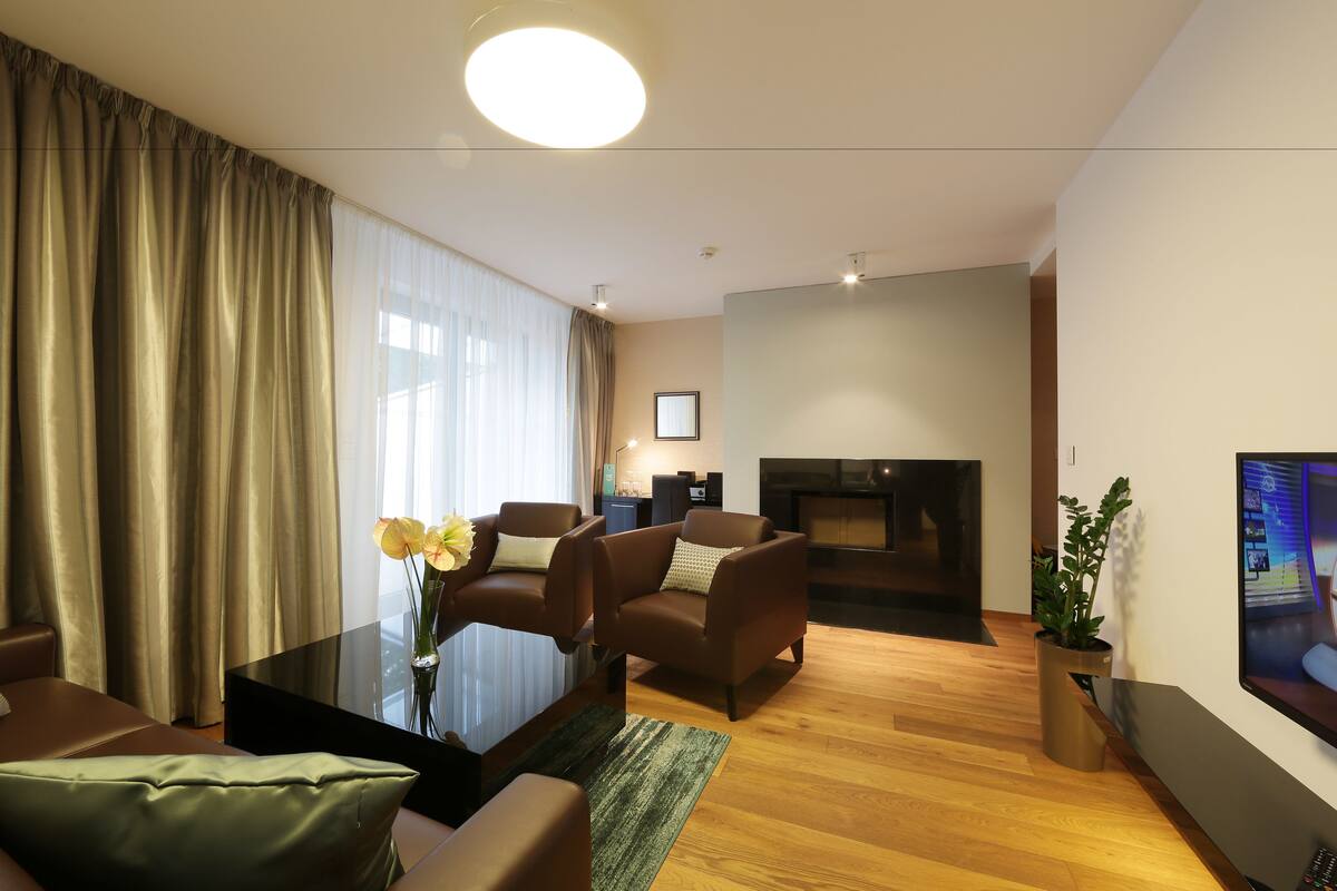 apartment, 1 bedroom, balcony, lake view | minibar, in-room safe, desk, soundproofing