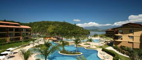 Outdoor pool, pool umbrellas, sun loungers
