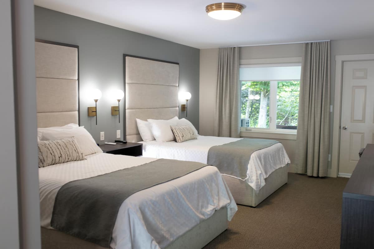 deluxe double room, 2 queen beds | 2 bedrooms, premium bedding, desk, iron/ironing board