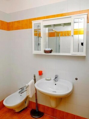Shower, free toiletries, hair dryer, bathrobes