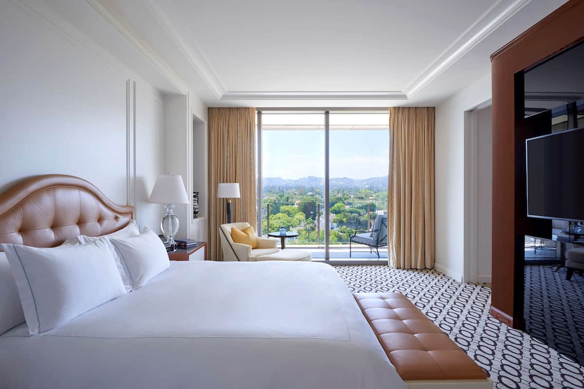 Luxe beddengoed, een minibar, een kluis op de kamer, een bureau