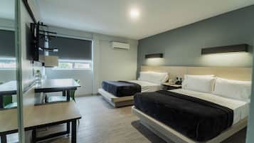 Habitación doble | Escritorio, cortinas blackout, wifi gratis y ropa de cama