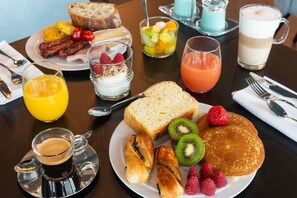Daily buffet breakfast (EUR 18 per person)