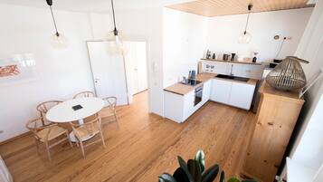 Enjoy meals in the kitchen with an oven and dining area.
