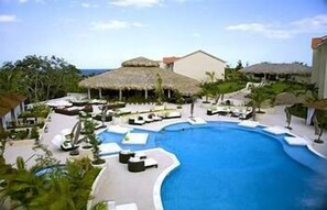 12 outdoor pools, pool umbrellas, pool loungers