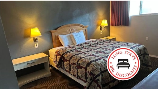 Premium bedding, iron/ironing board, free WiFi, bed sheets - Love Hotels Western Holiday by OYO at Harlan Lake NE (Alma)
