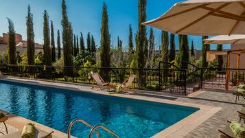 Outdoor pool, pool umbrellas, pool loungers