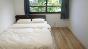 Economy Double Room, Non Smoking | Down comforters, desk, laptop workspace, soundproofing - Nagomi - Hostel (Tokyo)