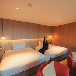 Twin Room Open-air Bath | Minibar, in-room safe, desk, iron/ironing board