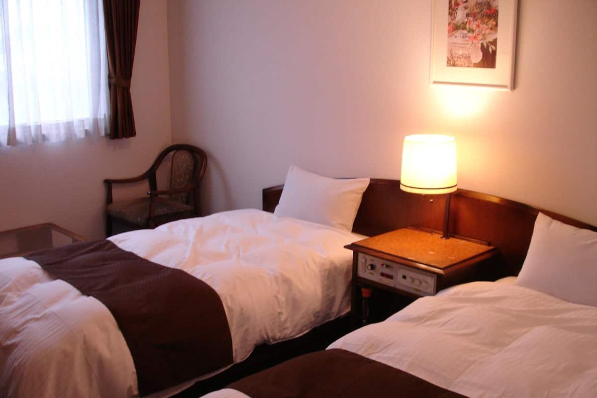 In-room safe, desk, laptop workspace, iron/ironing board