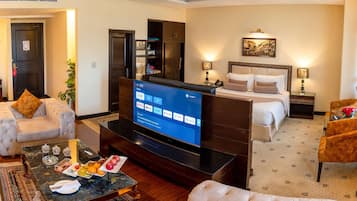 Panoramic Suite, 1 King Bed, Smoking | Minibar, in-room safe, desk, laptop workspace