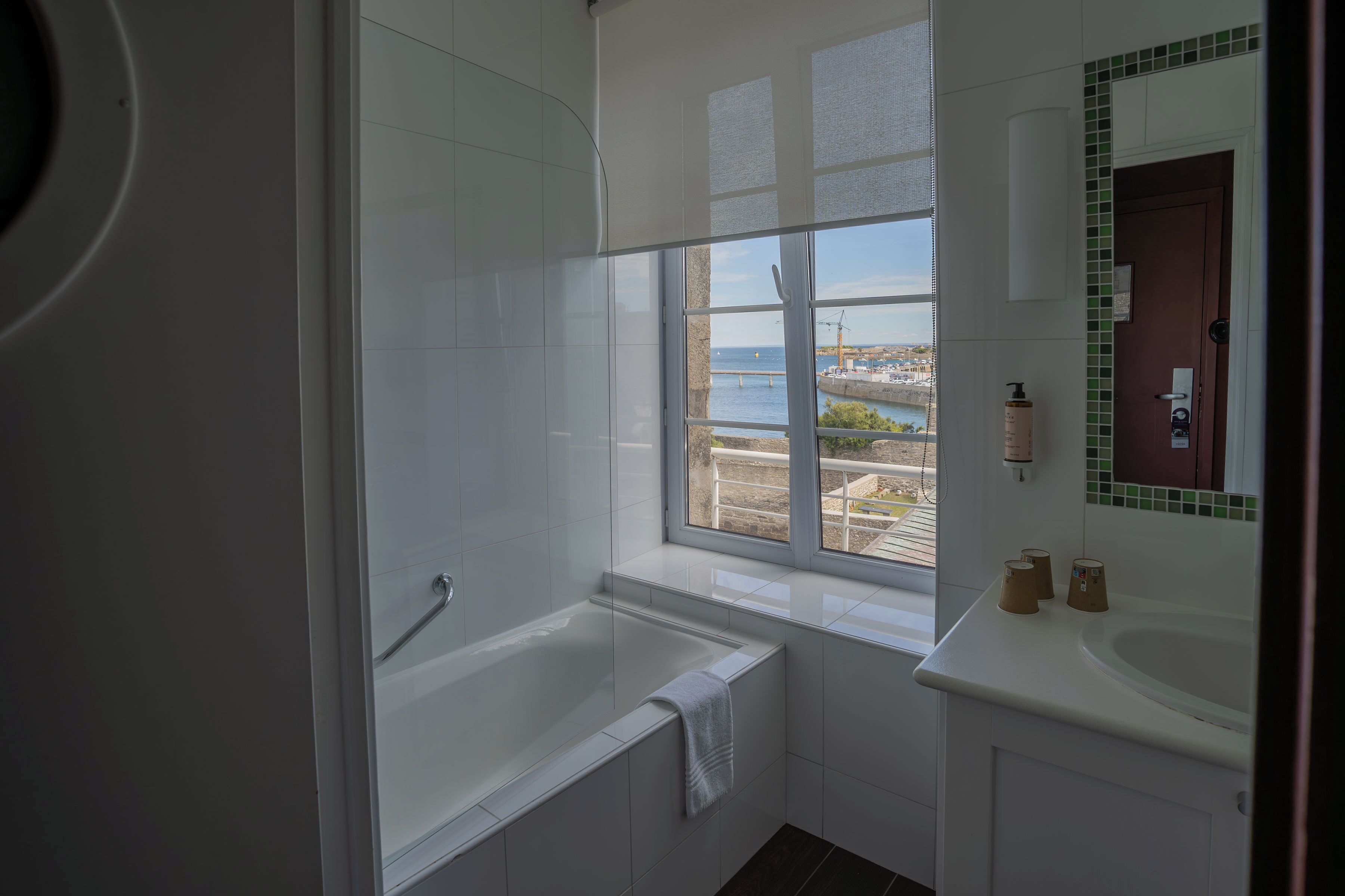 family room | bathroom | eco-friendly toiletries, hair dryer, towels, shampoo