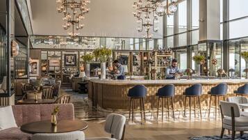 3 bars/lounges, poolside bar