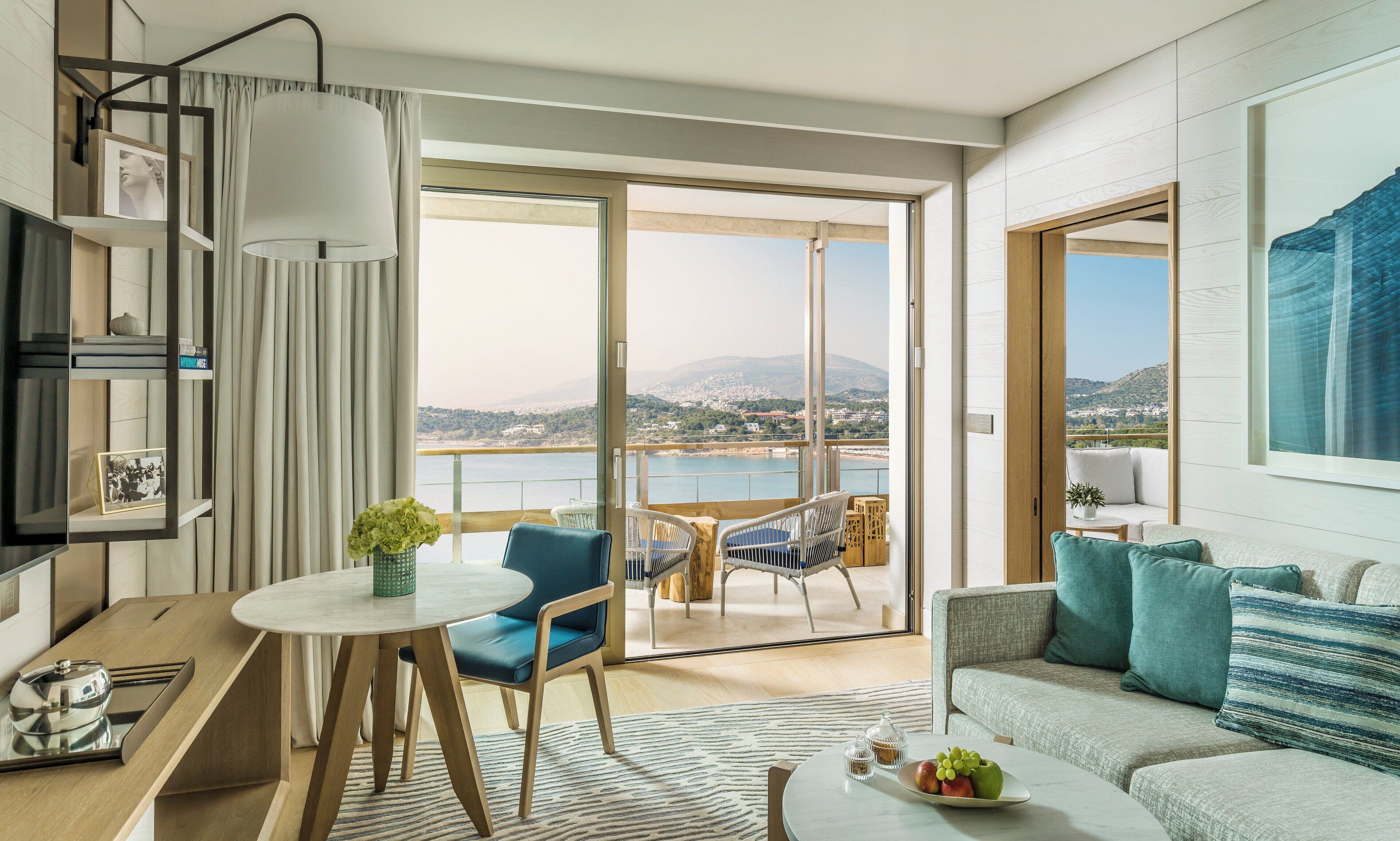 junior suite, 1 king bed, non smoking, sea view (arion) | premium bedding, down duvets, minibar, in-room safe