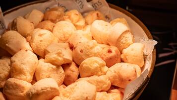 A bowl of cheese bread.