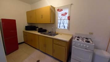Standard Apartment, 1 Queen Bed, Private Bathroom | Private kitchen | Full-size fridge, microwave, coffee/tea maker, electric kettle