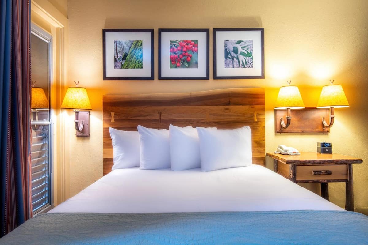 desk, iron/ironing board, travel cot, bed sheets