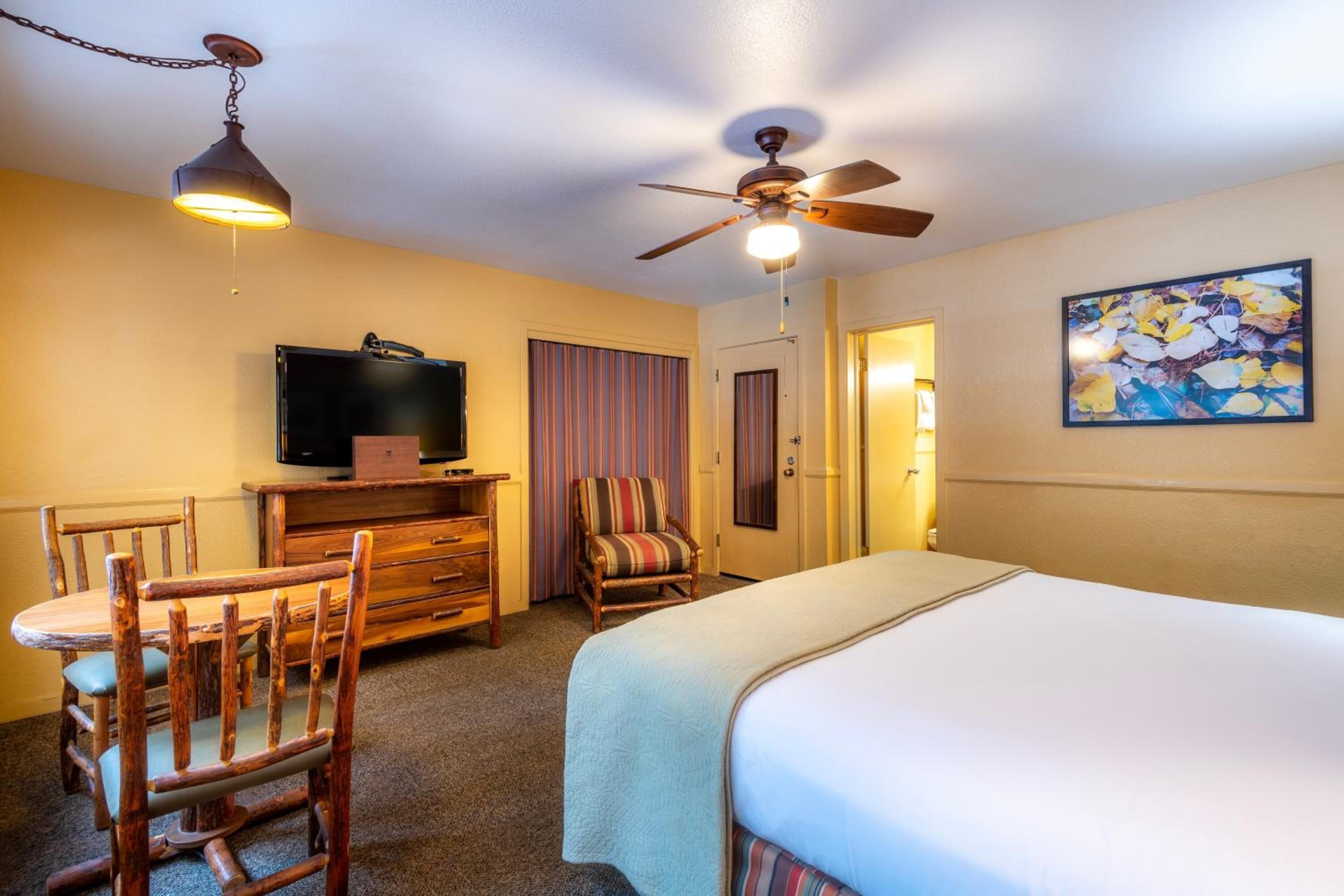 desk, iron/ironing board, travel cot, bed sheets