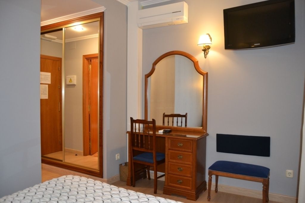economy double room | premium bedding, desk, blackout curtains, soundproofing