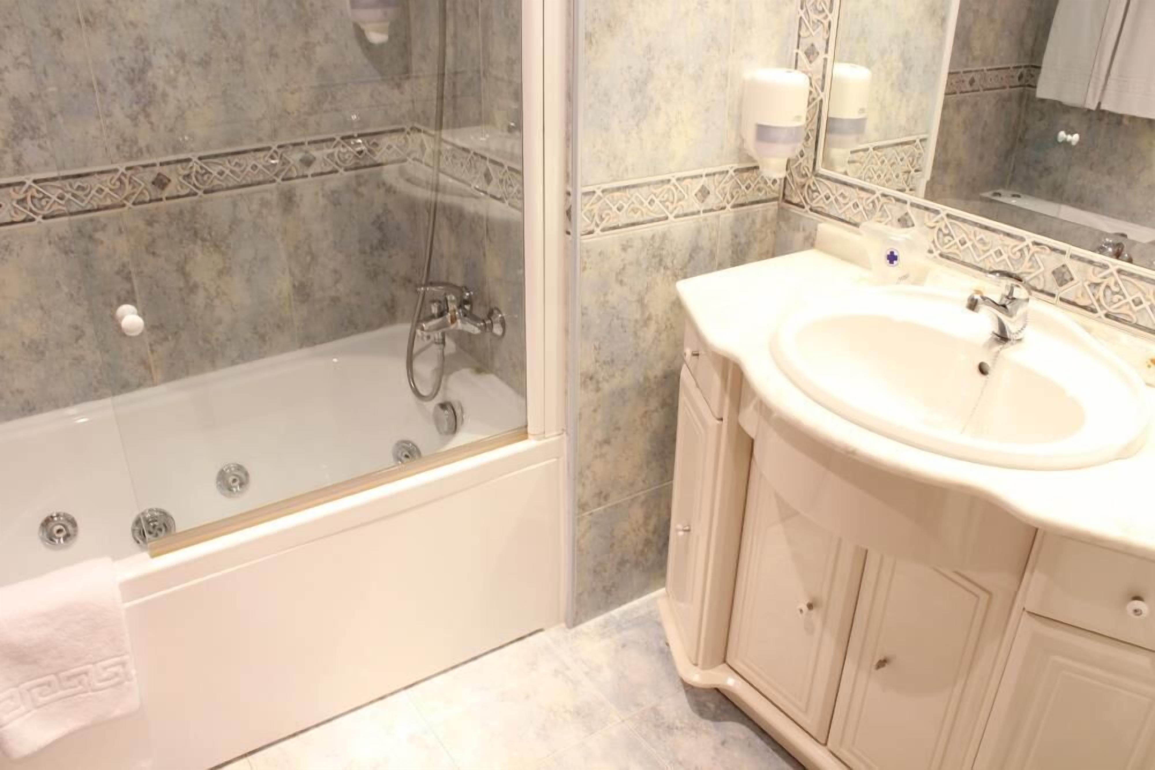 free toiletries, hair dryer, bidet, towels