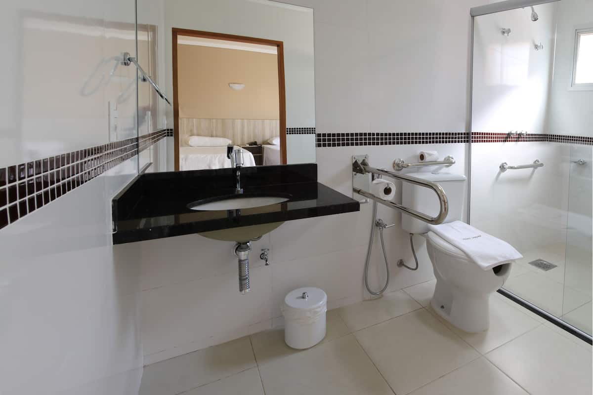 luxury single room | bathroom | shower, free toiletries, hair dryer, towels