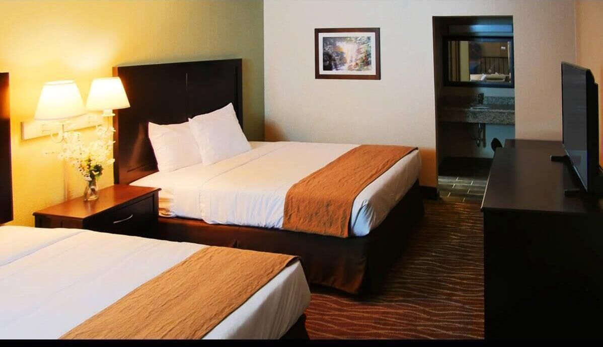 Desk, iron/ironing board, free cribs/infant beds, rollaway beds