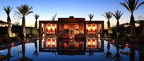 Outdoor pool, open 8:30 AM to 8:00 PM, free cabanas, pool umbrellas