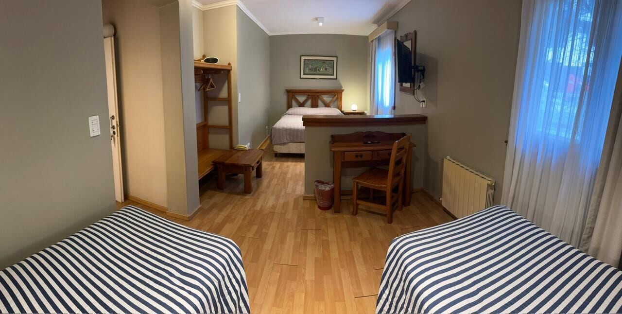 Triple Room | Down comforters, in-room safe, individually decorated, desk