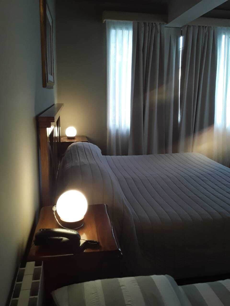 Quadruple Room | Down comforters, in-room safe, individually decorated, desk