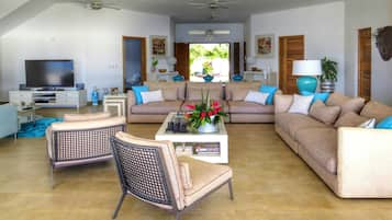 Deluxe Villa, 4 Bedrooms, Ocean View, Oceanfront | Living room | Flat-screen TV, DVD player