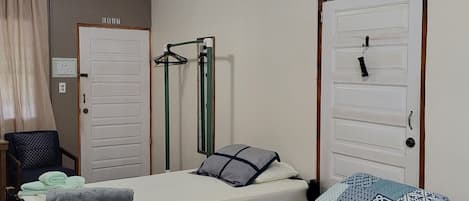 Standard Triple Room, 1 Bedroom, Ensuite, Ground Floor | 1 bedroom, individually decorated, individually furnished, desk