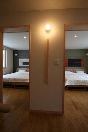 2 bedrooms, desk, iron/ironing board, cots/infant beds