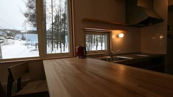 Full-size fridge, microwave, stovetop, electric kettle