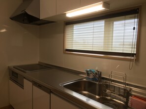 2 Bedroom Apartment, Non-Smoking, Mountain View | Private kitchen | Full-size fridge, microwave, stovetop, dishwasher - Ume House (Furano)