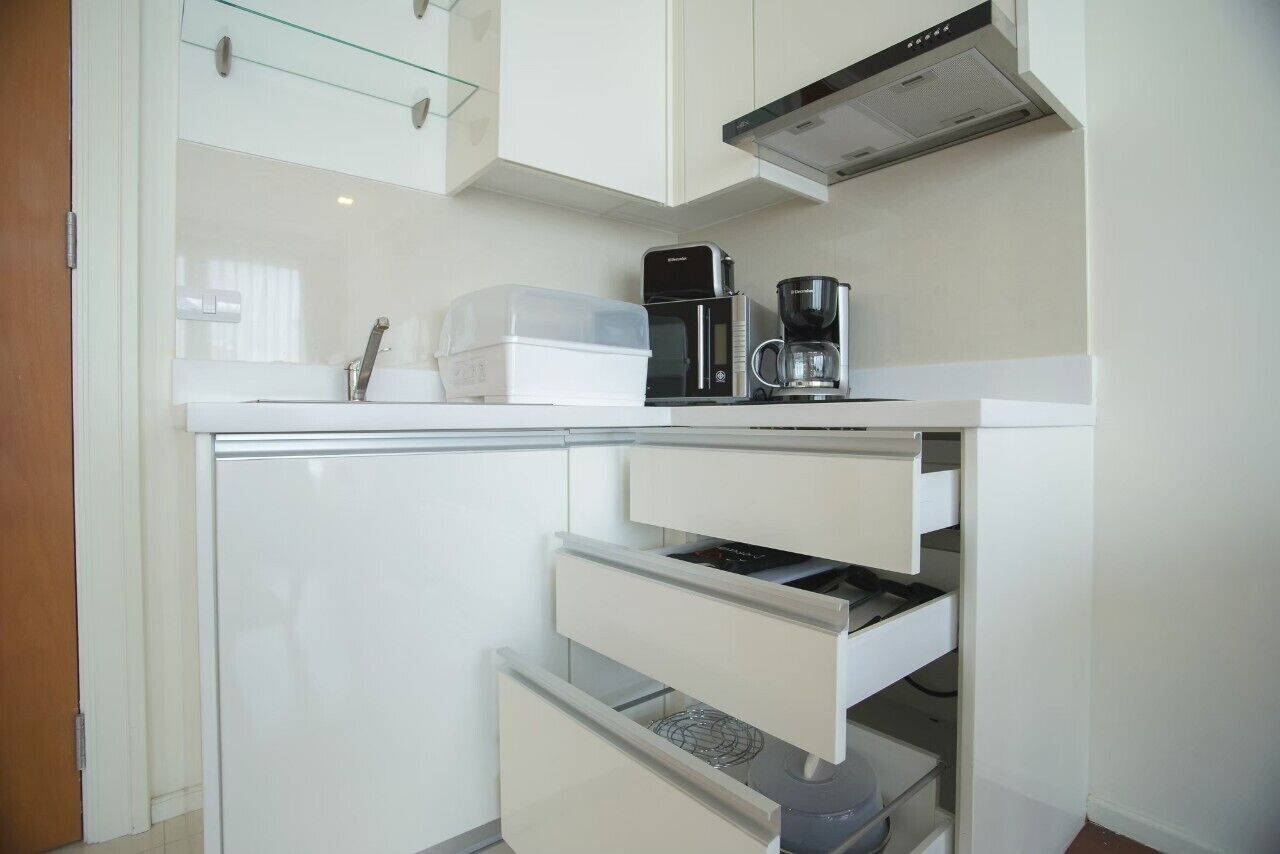 full-sized fridge, microwave, stovetop, dishwasher