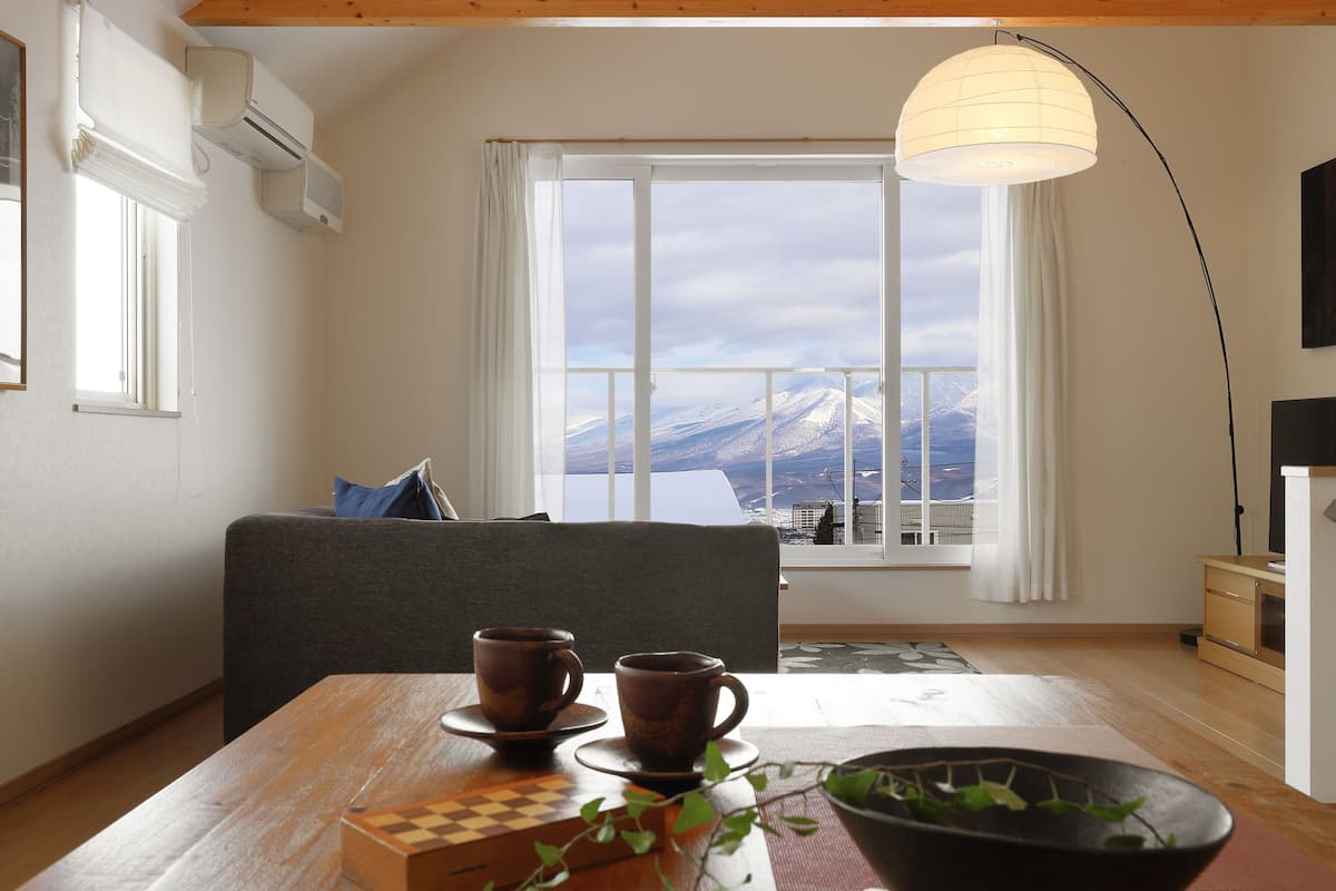 Apartment, 2 Bedrooms, Non Smoking (Unit A) | Living area | Flat-screen TV