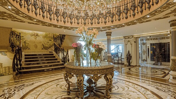 A grand lobby with a large chandelier, ornate railings, and a marble floor. - Sonesta St George Nile Cruise  Ship - 3 & 7 Nights - From  Aswan  Every Friday (Luxor)
