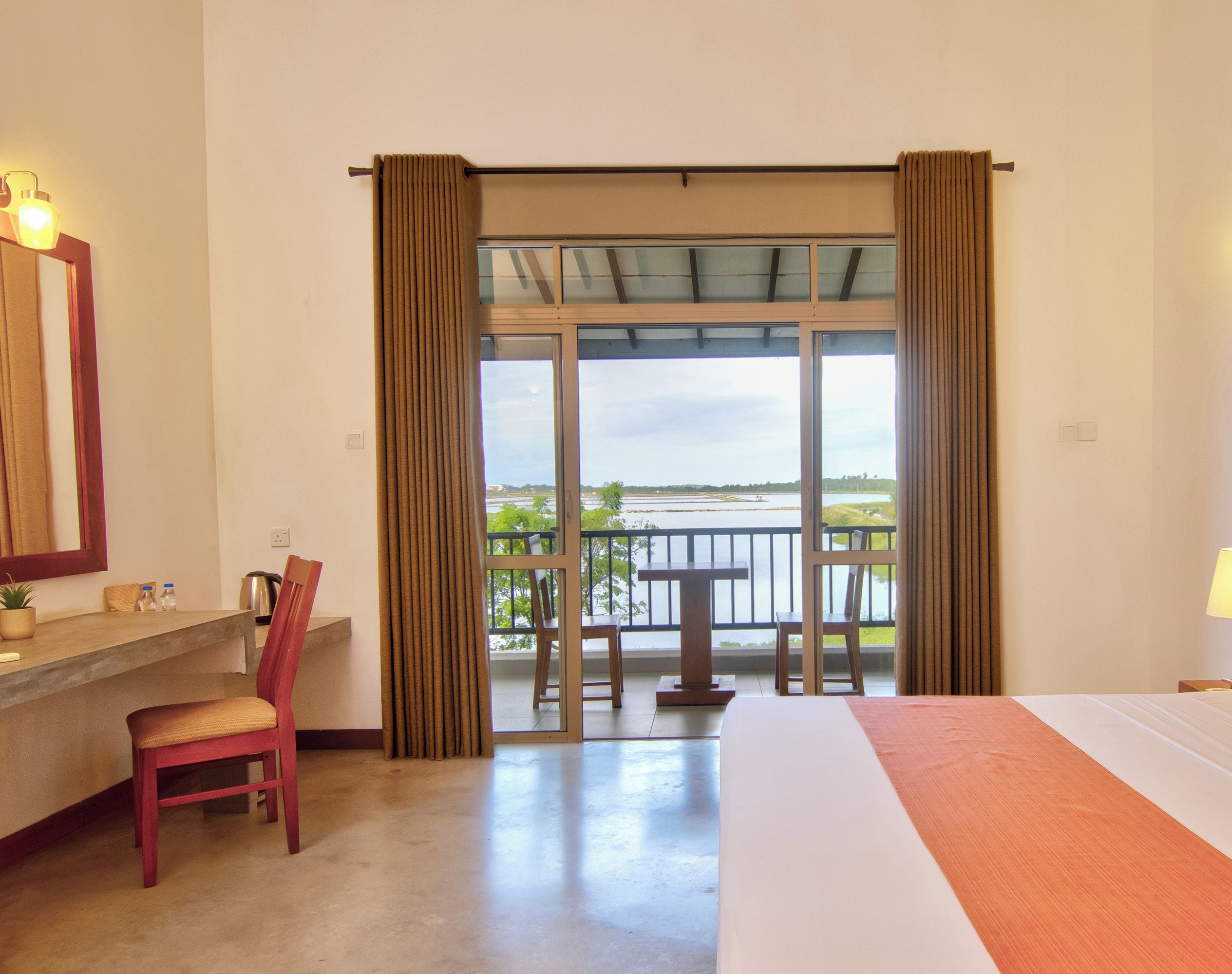 Deluxe Triple Room, Lake View | In-room safe, desk, blackout drapes, soundproofing