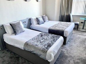 Phòng dành cho gia đình | Truy cập Internet không dây miễn phí, bộ trải giường 