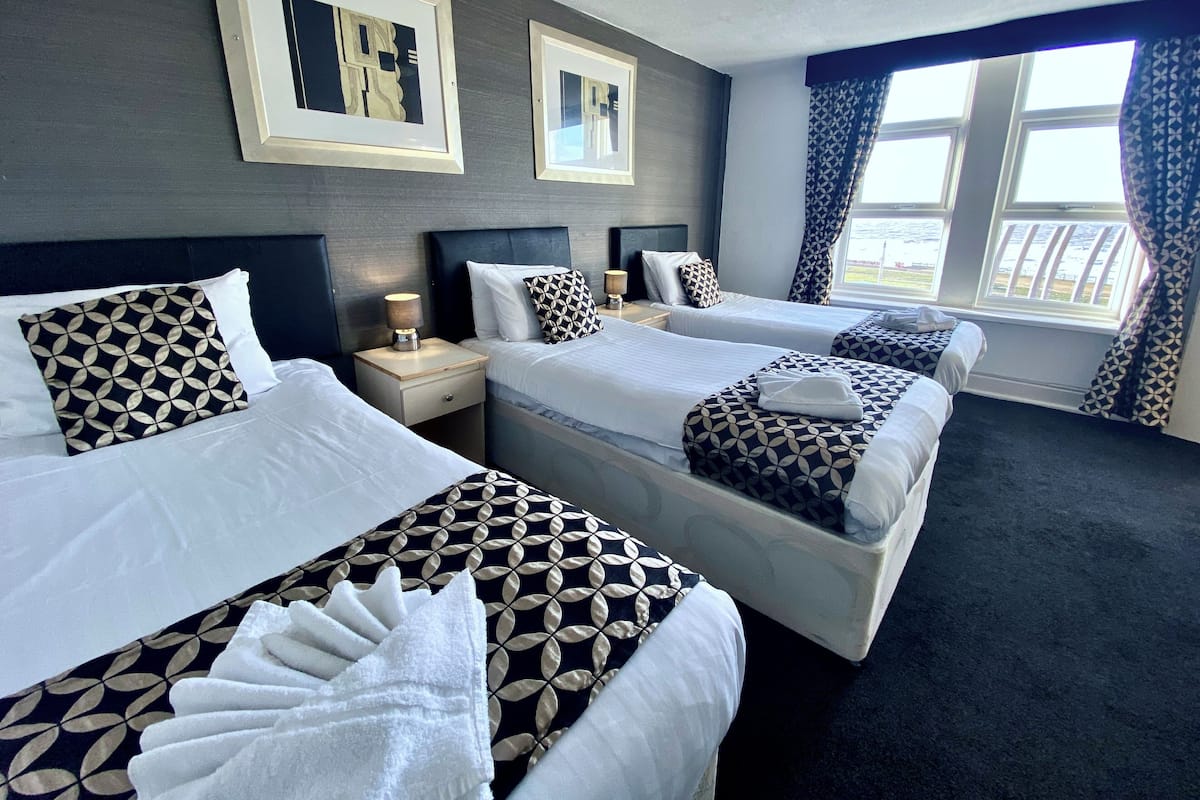 Tremannsrom – standard, sjøutsikt | Wi-fi (inkludert) og sengetøy