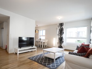 Apartment, 2 Bedrooms, Accessible, Sauna | Living room | Flat-screen TV - Kotimaailma Apartments Kuopio (Kuopio)