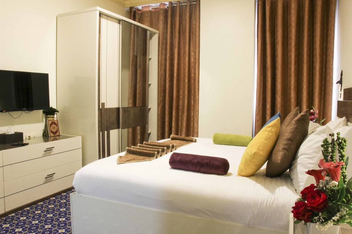 Premium bedding, down comforters, pillowtop beds, minibar