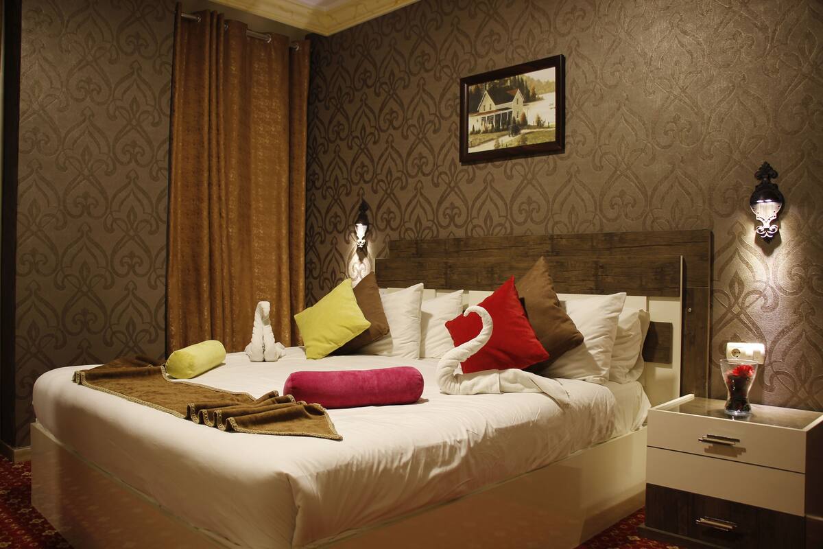 Family Suite, 2 Bedrooms | Living area | TV