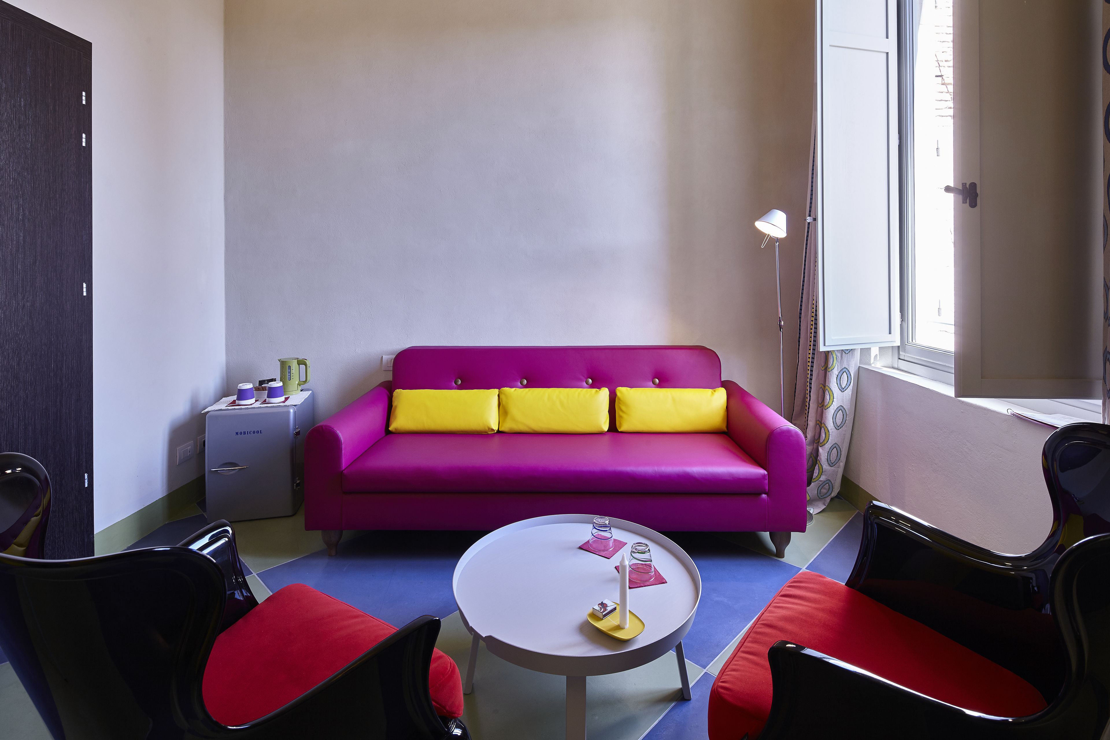 panoramic suite (luxury) | living area | flat-screen tv, heated floors