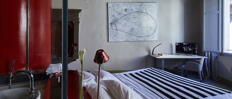 Premium bedding, down comforters, memory foam beds, minibar