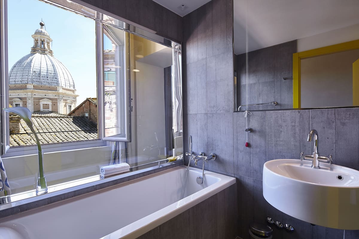 panoramic suite (luxury) | bathroom | eco-friendly toiletries, hair dryer, bathrobes, bidet