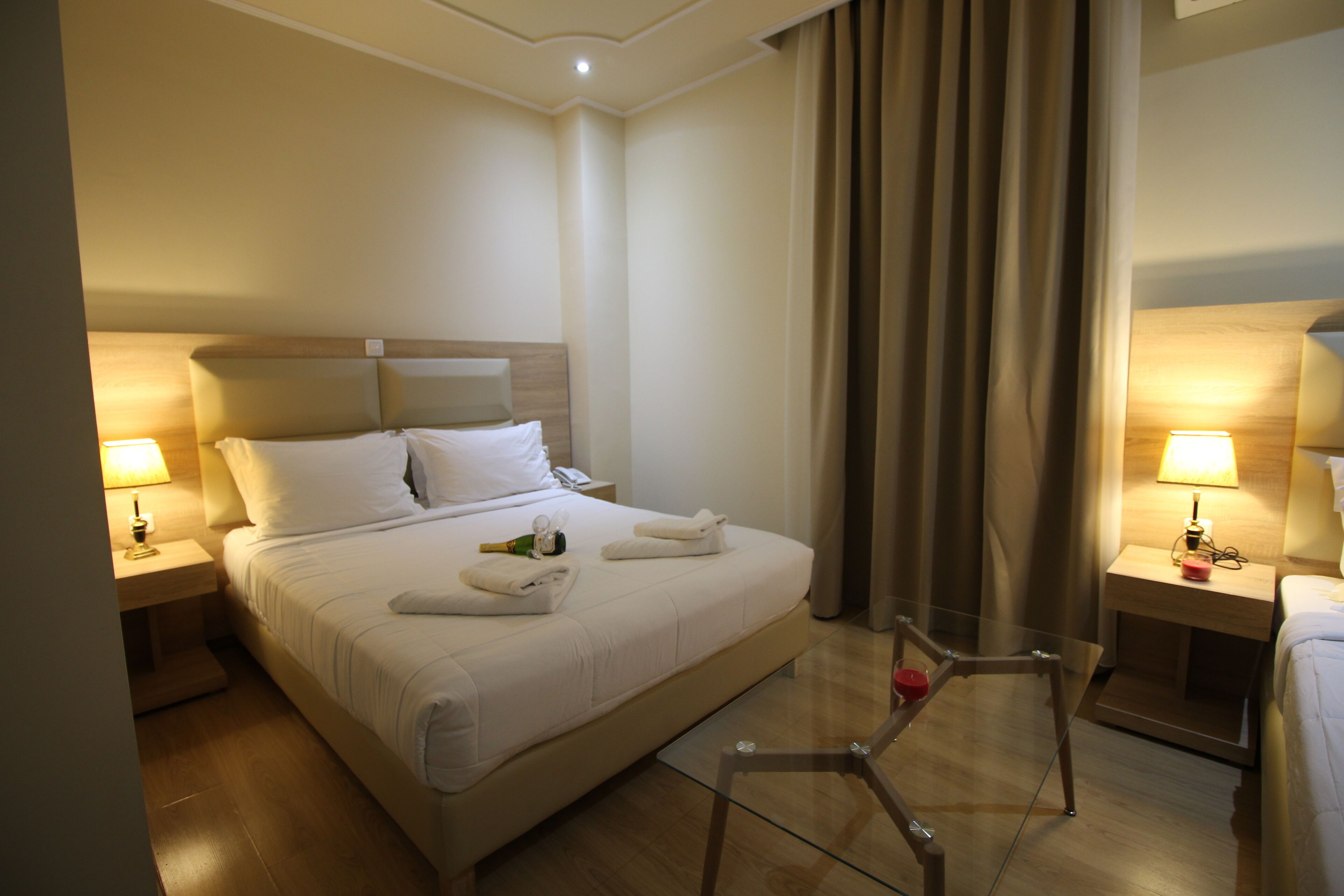 Deluxe Triple Room, Private Bathroom | Soundproofing, iron/ironing board, free WiFi, bed sheets
