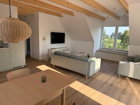 Design Apartment, Private Bathroom (Große Maräne Oben) | Lounge. Restaurant und Pension Zur Wildgans